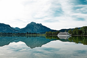 MS Füssen (town) on the Forggensee with Füssen (town), in the background castle Neuschwanstein MS Füssen (town) on the Forggensee with Füssen (town), in the background castle Neuschwanstein